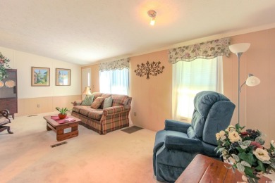 Welcome to Oceanside Landing, a highly sought-after 55+