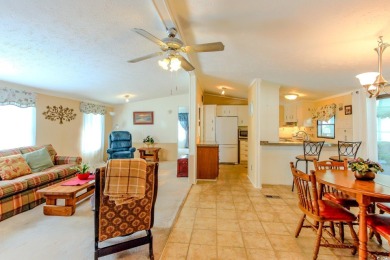 Welcome to Oceanside Landing, a highly sought-after 55+