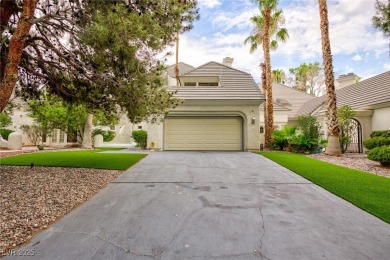 Located in the prestigious guard-gated Las Vegas Country Club