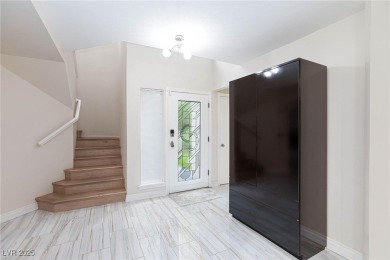 Located in the prestigious guard-gated Las Vegas Country Club