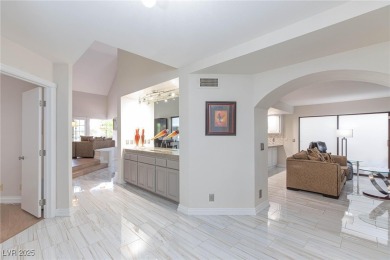 Located in the prestigious guard-gated Las Vegas Country Club