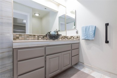 Located in the prestigious guard-gated Las Vegas Country Club