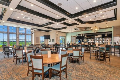 *FURNISHED END UNIT plus a DEN with WATER & GOLF COURSE VIEWS!