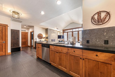 Experience elevated Northstar Village living from this freshly