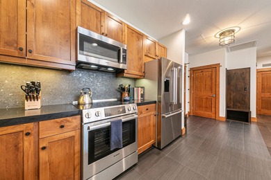 Experience elevated Northstar Village living from this freshly