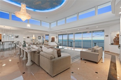 Located in the private, gated enclave of Esplanade on the Bay