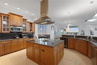 Located in the private, gated enclave of Esplanade on the Bay