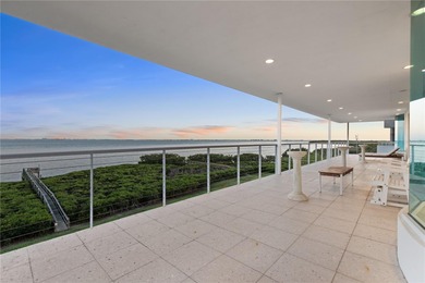 Located in the private, gated enclave of Esplanade on the Bay
