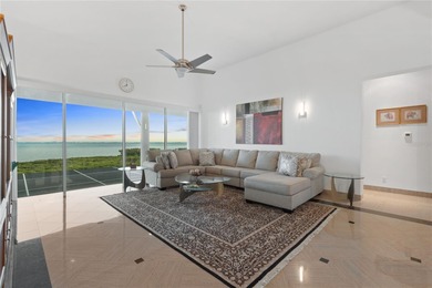 Located in the private, gated enclave of Esplanade on the Bay