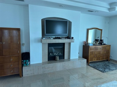 Located in the private, gated enclave of Esplanade on the Bay