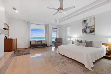 Located in the private, gated enclave of Esplanade on the Bay