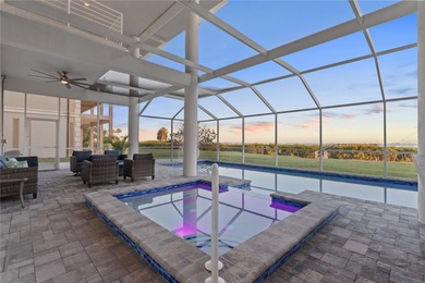 Located in the private, gated enclave of Esplanade on the Bay