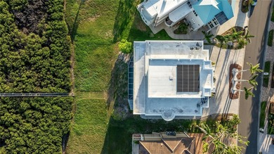 Located in the private, gated enclave of Esplanade on the Bay