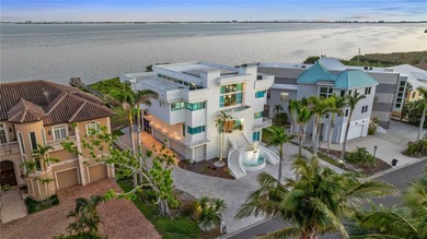 Located in the private, gated enclave of Esplanade on the Bay
