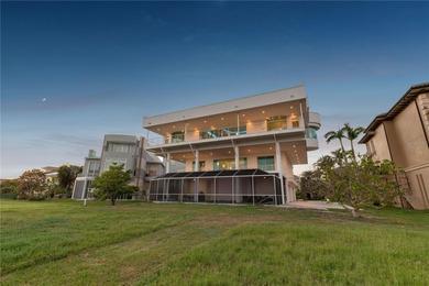 Located in the private, gated enclave of Esplanade on the Bay