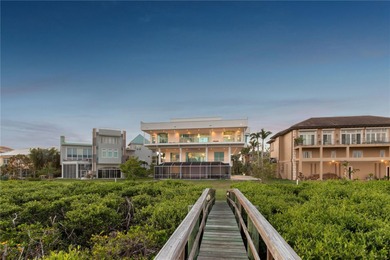 Located in the private, gated enclave of Esplanade on the Bay