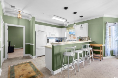 Welcome to refined coastal living in this elegant 3-bedroom