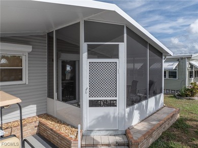 Charming Turnkey Home in Tamiami 55+ Community Welcome to this