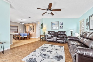 Charming Turnkey Home in Tamiami 55+ Community Welcome to this