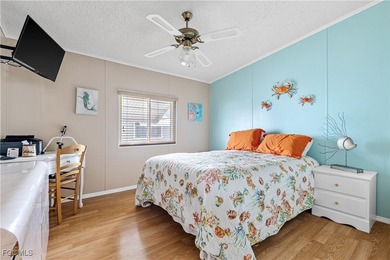 Charming Turnkey Home in Tamiami 55+ Community Welcome to this