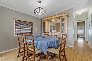 Charming Turnkey Home in Tamiami 55+ Community Welcome to this