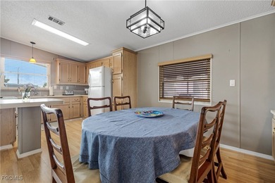 Charming Turnkey Home in Tamiami 55+ Community Welcome to this