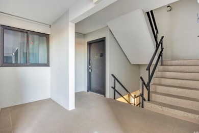 Welcome to 601 Mitchell Dr Unit 203 at Holiday Tower, a fully