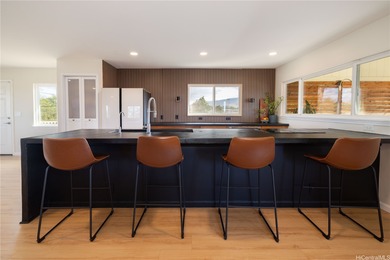 Nestled on a peaceful corner lot, this thoughtfully designed