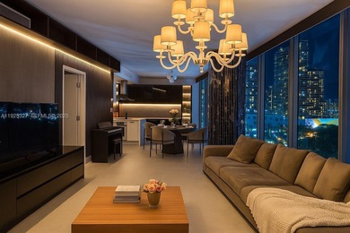 Step into a corner residence wrapped in floor-to-ceiling glass