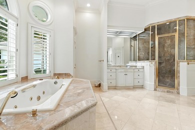 Refined Single-Level Living with Poolside Perfection and Golf