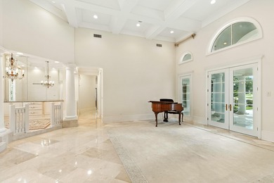 Refined Single-Level Living with Poolside Perfection and Golf