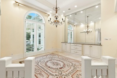 Refined Single-Level Living with Poolside Perfection and Golf