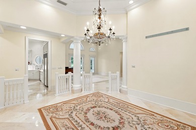 Refined Single-Level Living with Poolside Perfection and Golf