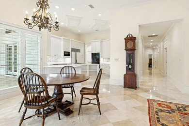 Refined Single-Level Living with Poolside Perfection and Golf