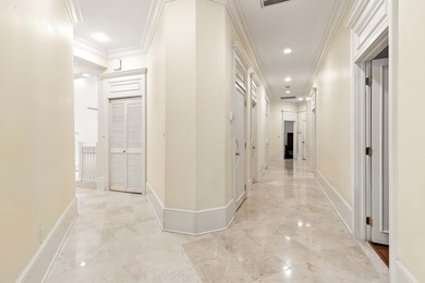 Refined Single-Level Living with Poolside Perfection and Golf