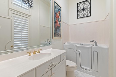 Refined Single-Level Living with Poolside Perfection and Golf