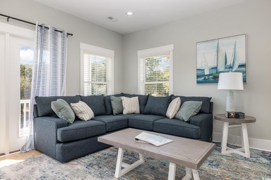 Just a quarter mile from the beach, this stunning 5-bedroom, 5