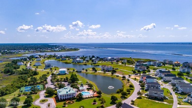 Experience refined coastal living on the Crystal Coast in this