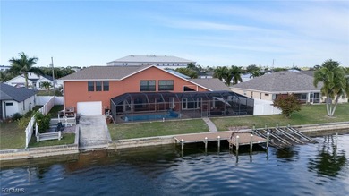 Welcome to a truly rare Cape Coral waterfront estate located on