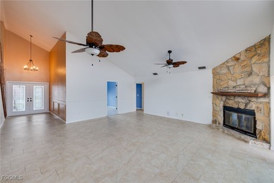 Welcome to a truly rare Cape Coral waterfront estate located on