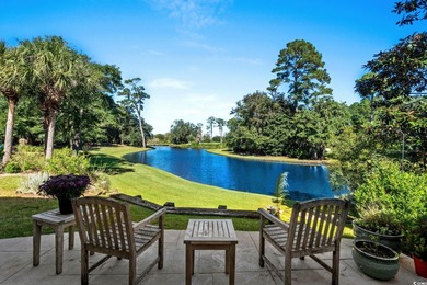 This all-brick custom-built home in the gated community of