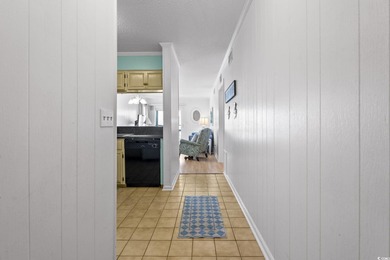 Discover this charming 2-bedroom, 2-bath condo in the highly