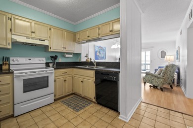 Discover this charming 2-bedroom, 2-bath condo in the highly