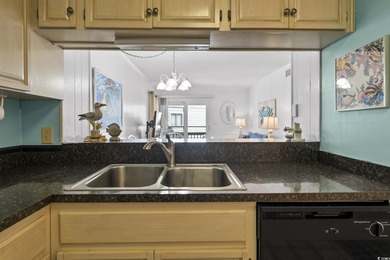 Discover this charming 2-bedroom, 2-bath condo in the highly