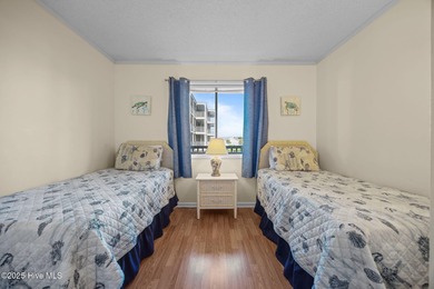 This oceanfront, 1st floor condo is priced just over tax