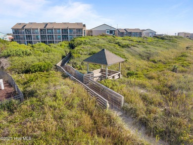 This oceanfront, 1st floor condo is priced just over tax