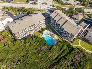 This oceanfront, 1st floor condo is priced just over tax