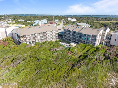 This oceanfront, 1st floor condo is priced just over tax