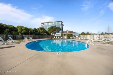 This oceanfront, 1st floor condo is priced just over tax