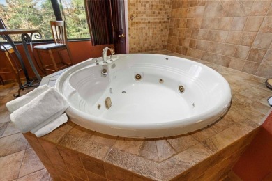 Facing the Wisconsin River, this spacious 3-bedroom, 3-bathroom